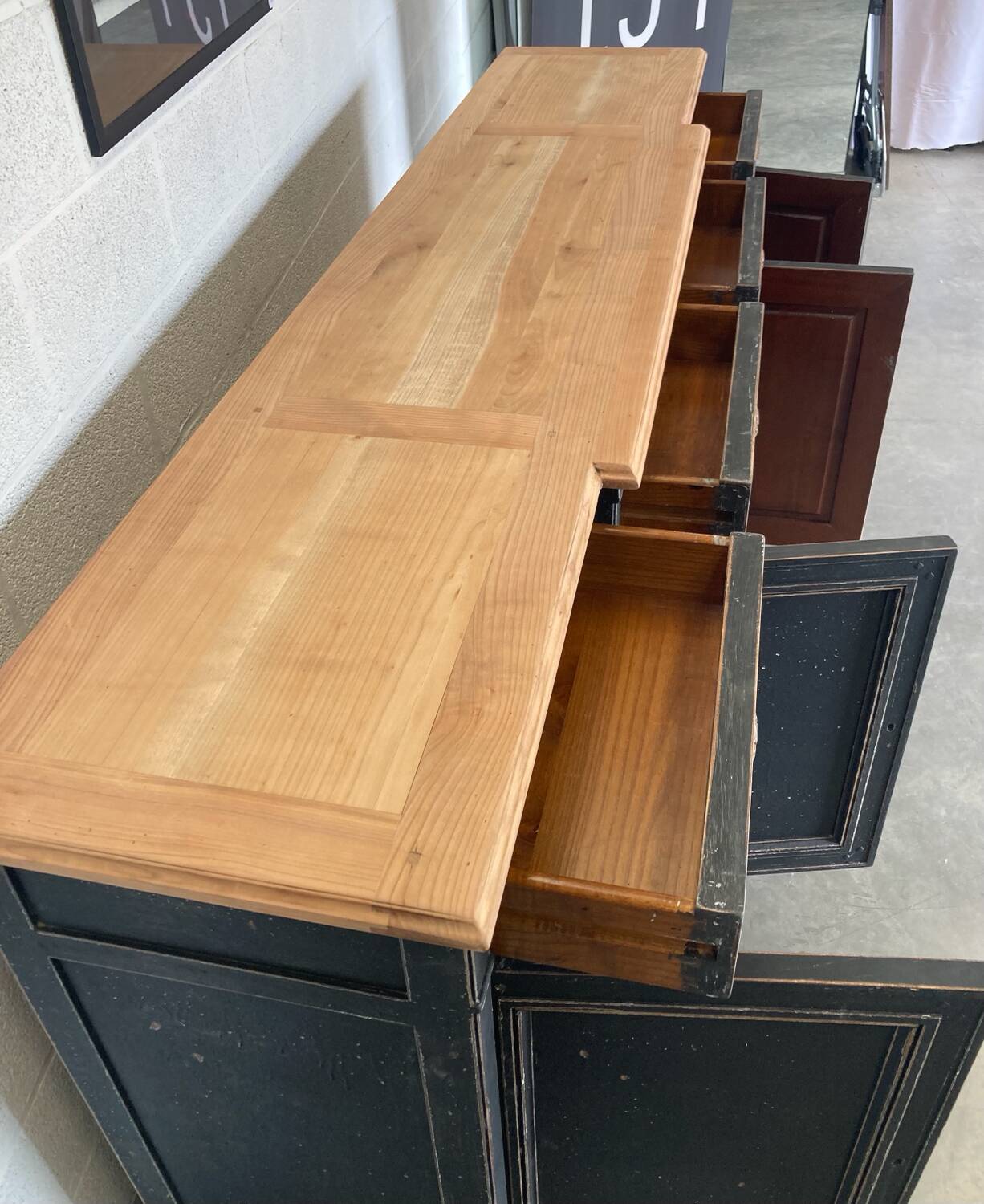 Old sideboard with four doors and four drawers