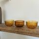 3 "Lever" brand bowls, amber textured