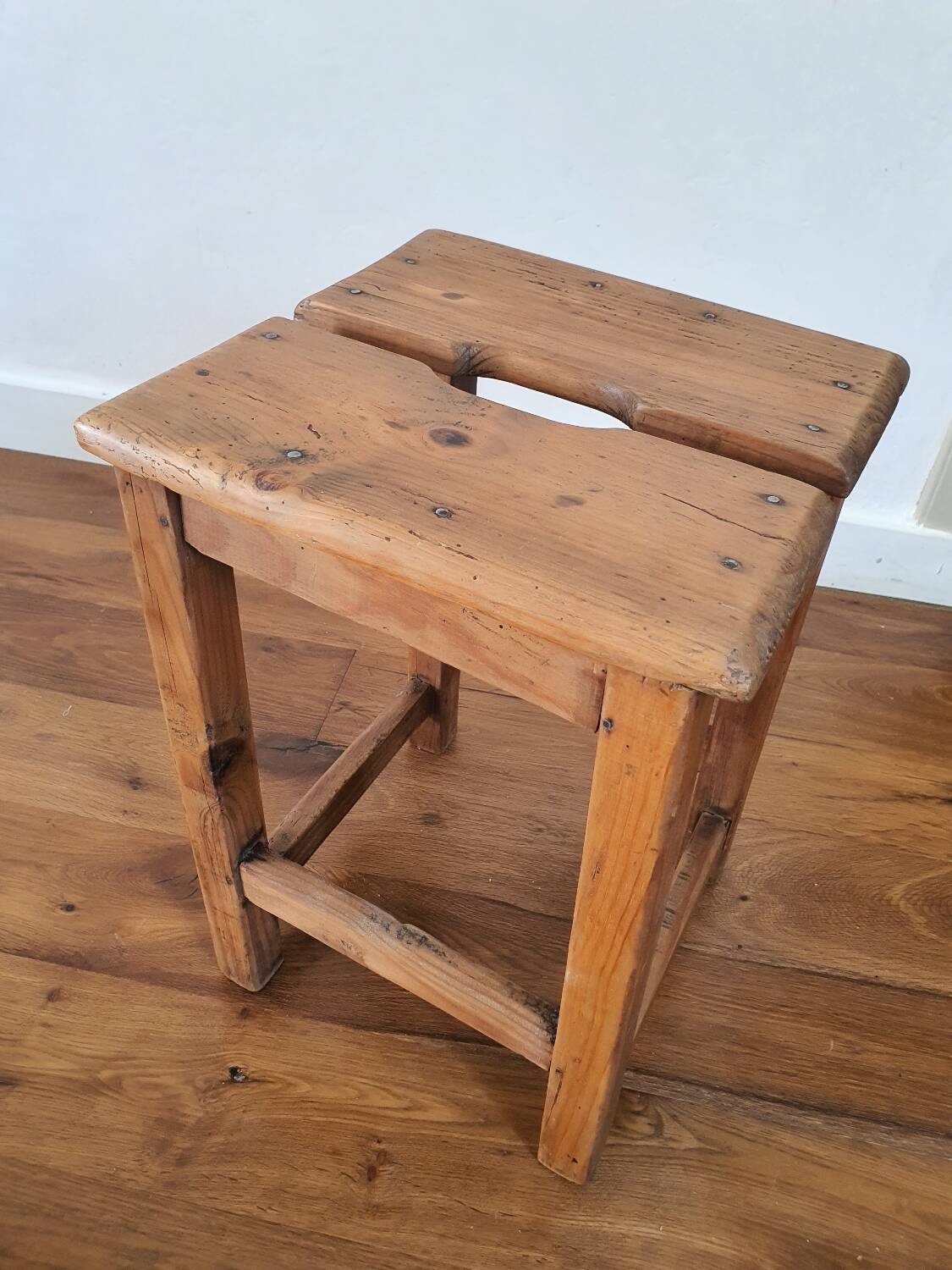 Antique wooden farm stool