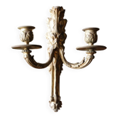 Monobloc gilded bronze wall light, grotesque satyr, two lights.