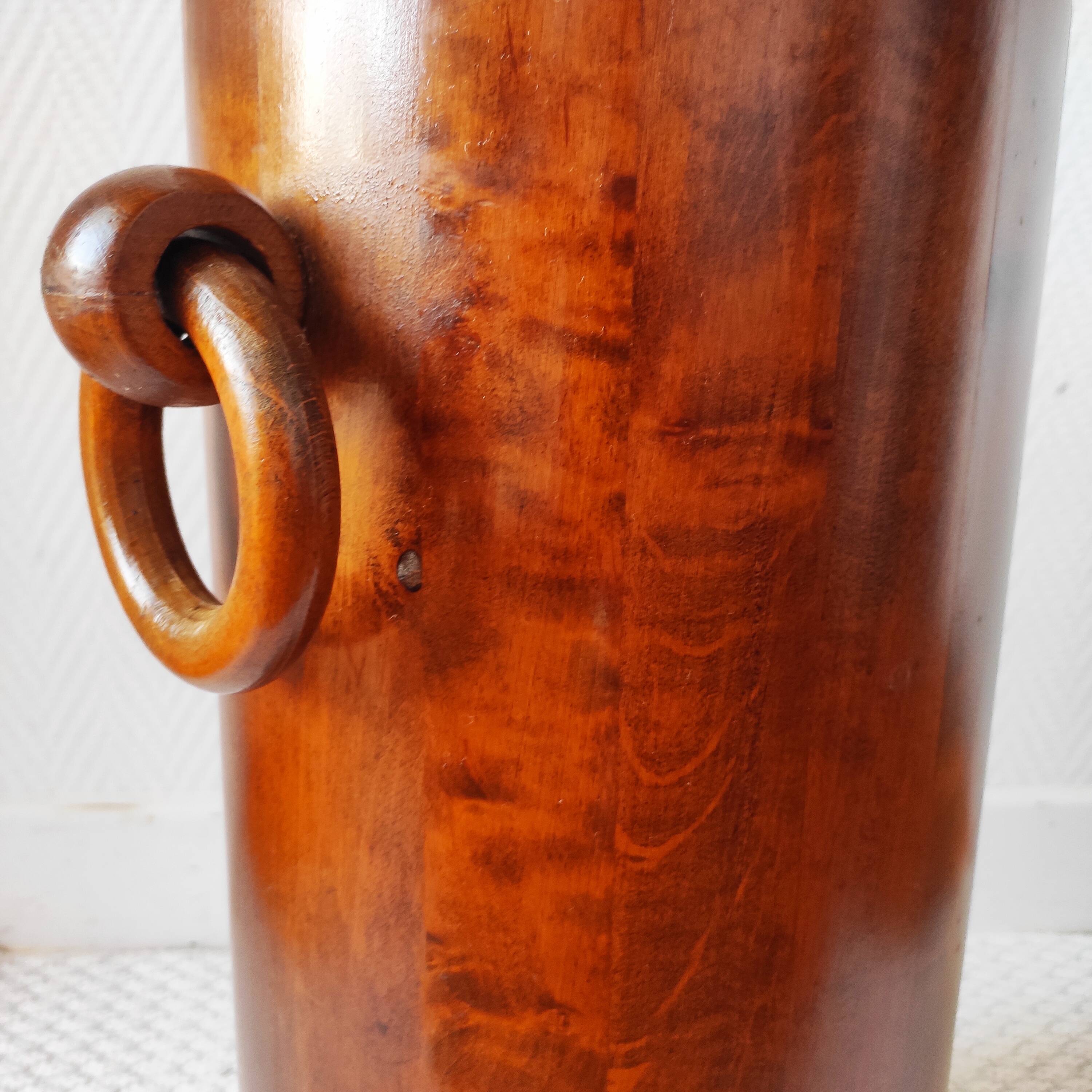 Brutalist sculptural wooden umbrella stand from the 1970s.
