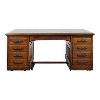 Grand bureau ancien avec plateau en cuir noir