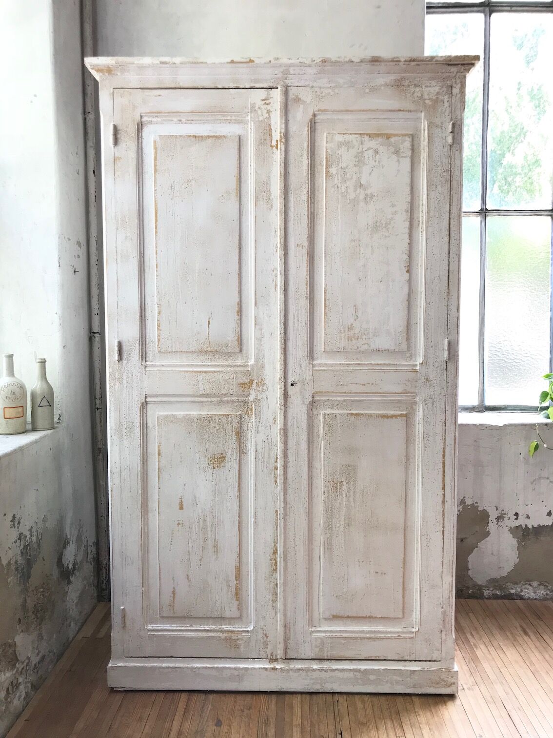 Antique wardrobe in patinated pine