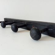 Old wooden wall coat rack