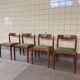 Set of four vintage solid teak dining chairs