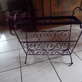 Magazine holder and wrought iron plant