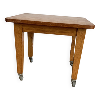Vintage coffee table on casters