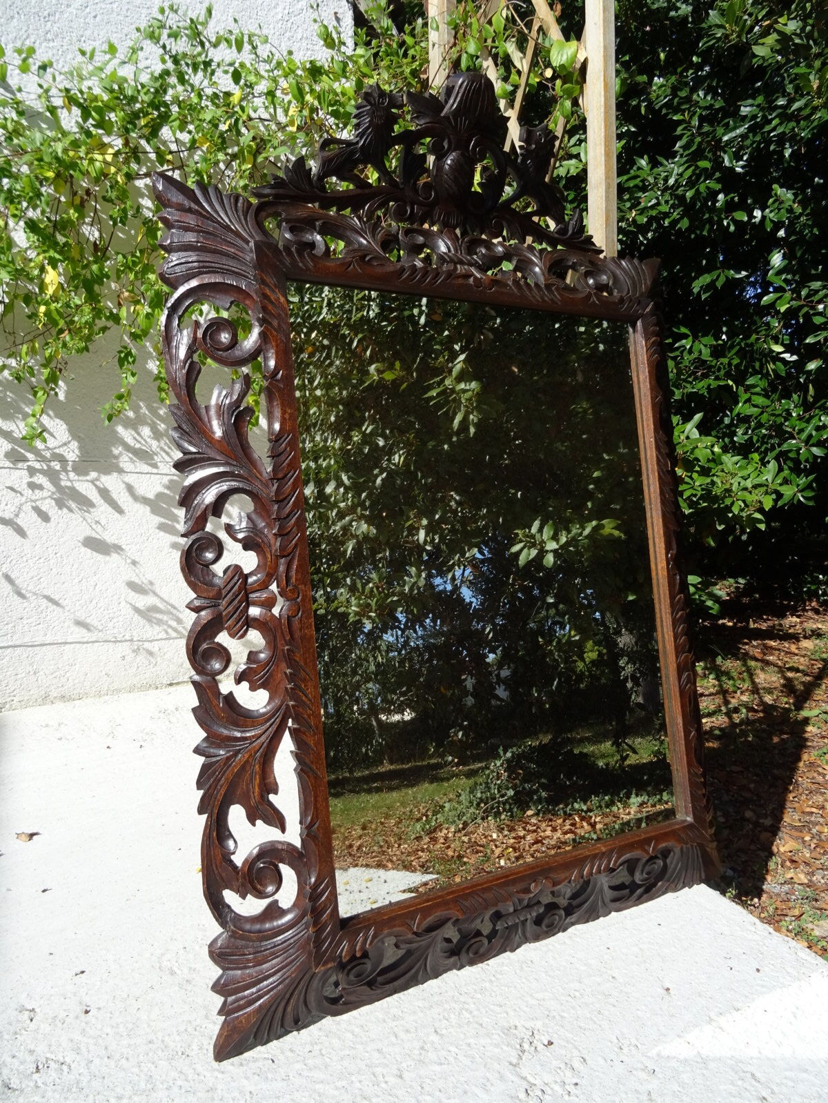 Miroir sculpté fronton lions
