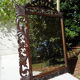 Miroir sculpté fronton lions