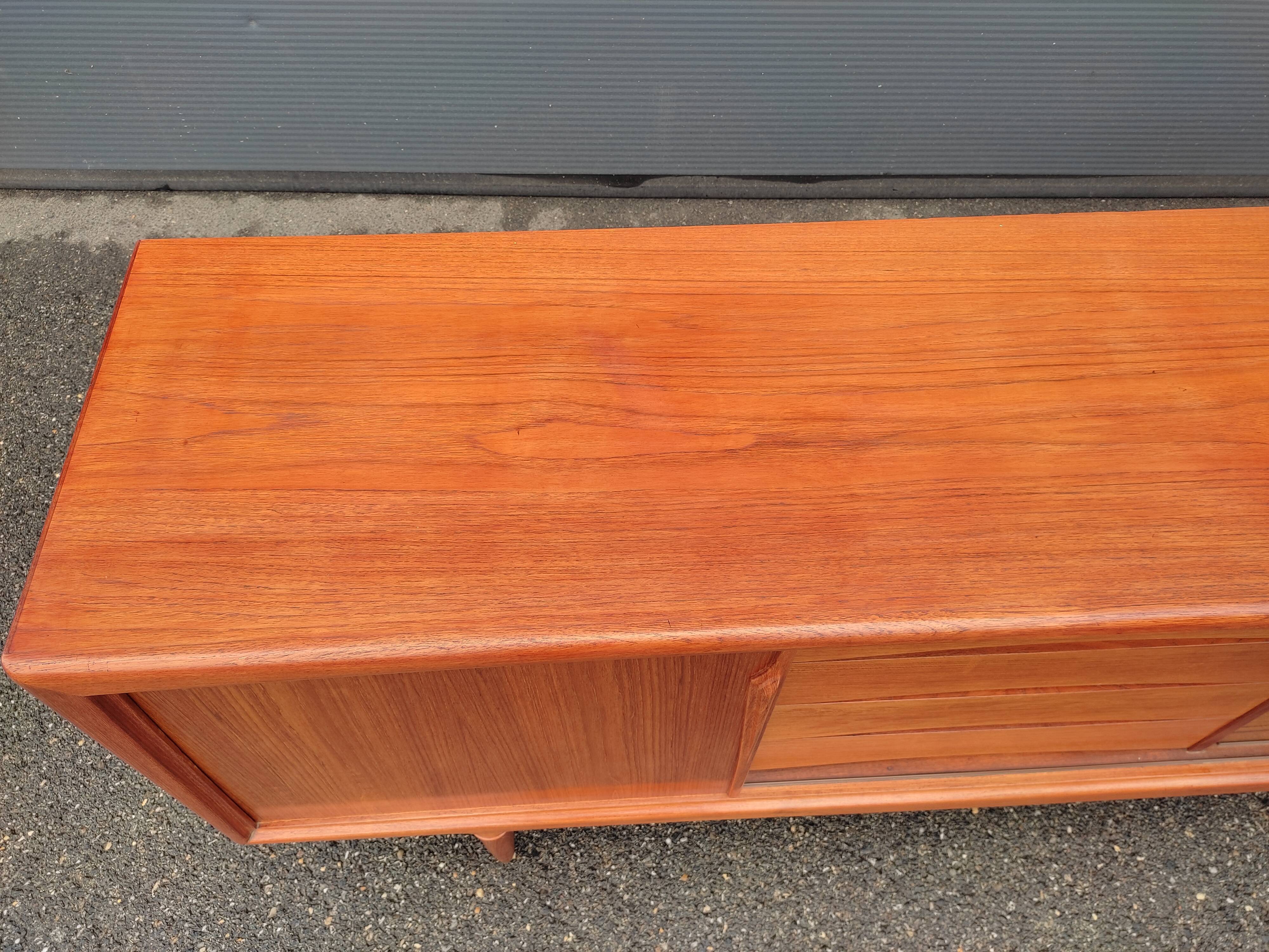 Scandinavian teak row by Axel Christensen for ACO Mobler