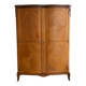 Antique Louis XV wardrobe in wood with chevron pattern.