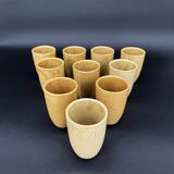 10 glazed stoneware cups signed Digoin