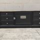 Low TV cabinet with black patina, twelve drawers and one door