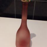Old pink frosted glass liquor decanter with decorated cap