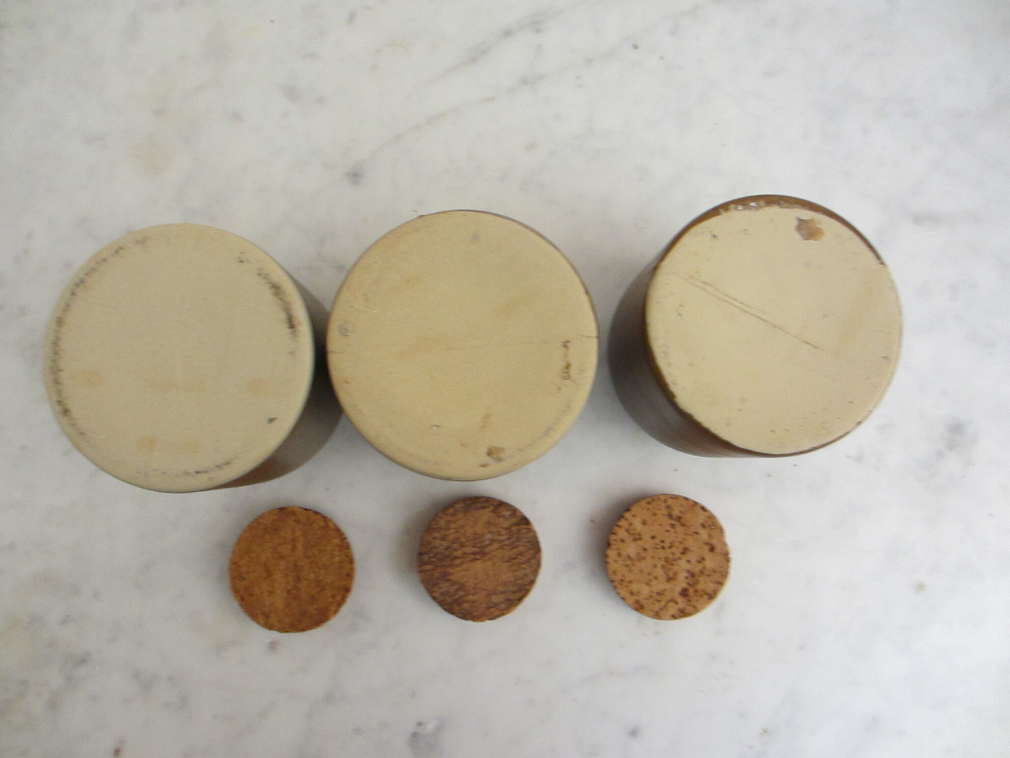 Series of 3 sandstone pots