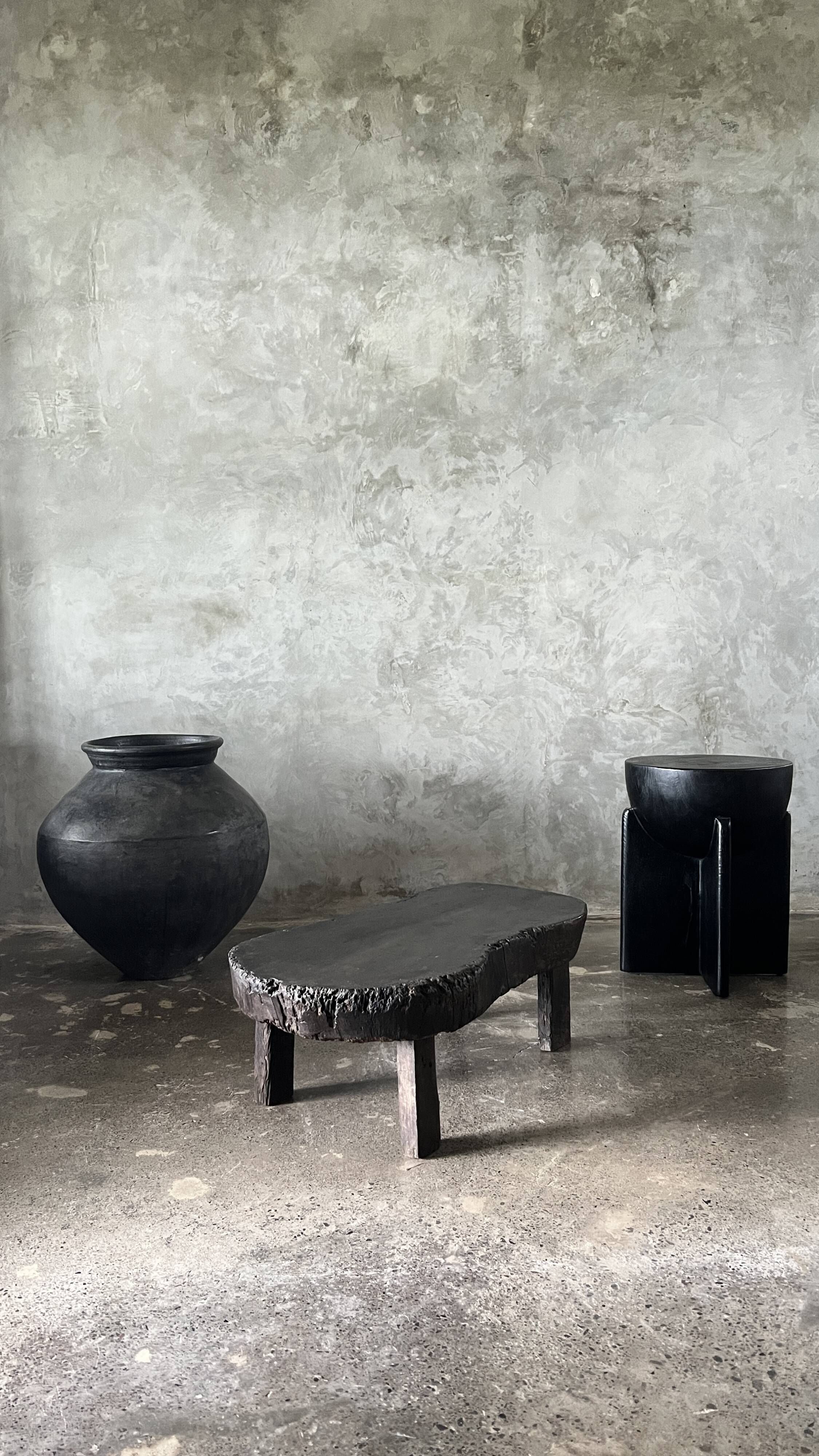 Small old Asian wooden coffee table in Japanese style, kidney-shaped top