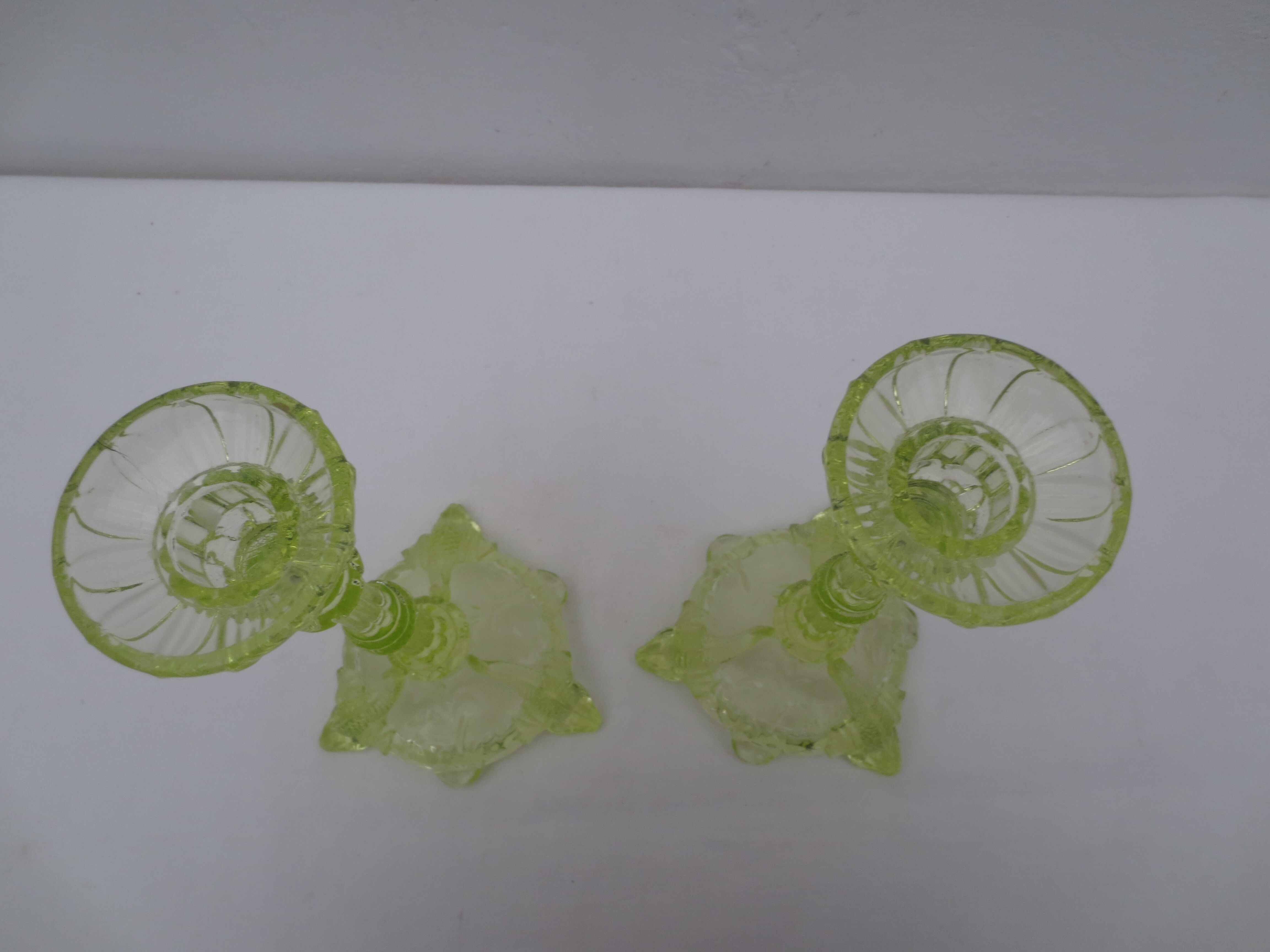 pair of old anise-green glass candlesticks