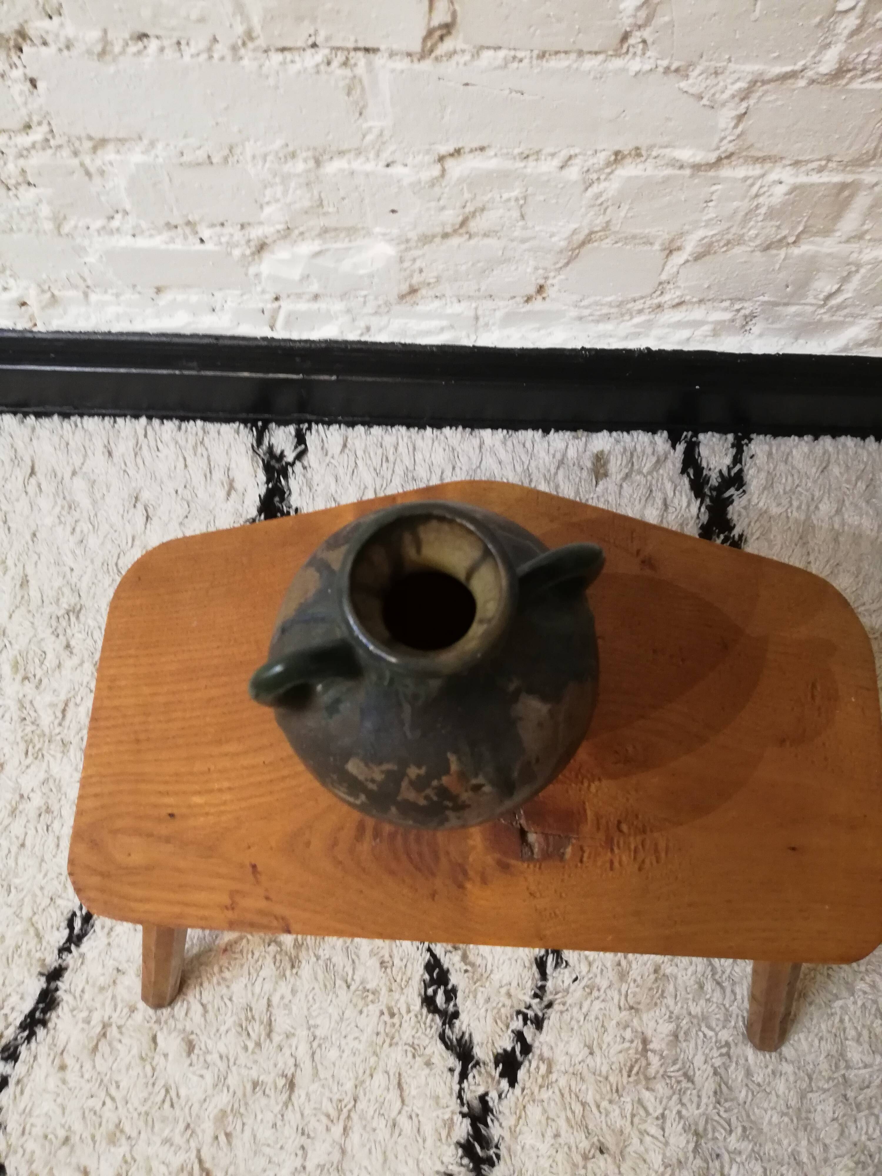 Old glazed terracotta vase