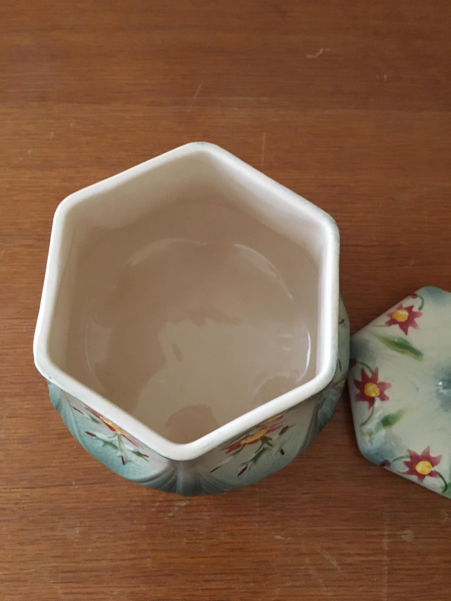 Sugar bowl in slip stamped Saint Clément and numbered 6461. Hand painted.