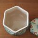 Sugar bowl in slip stamped Saint Clément and numbered 6461. Hand painted.