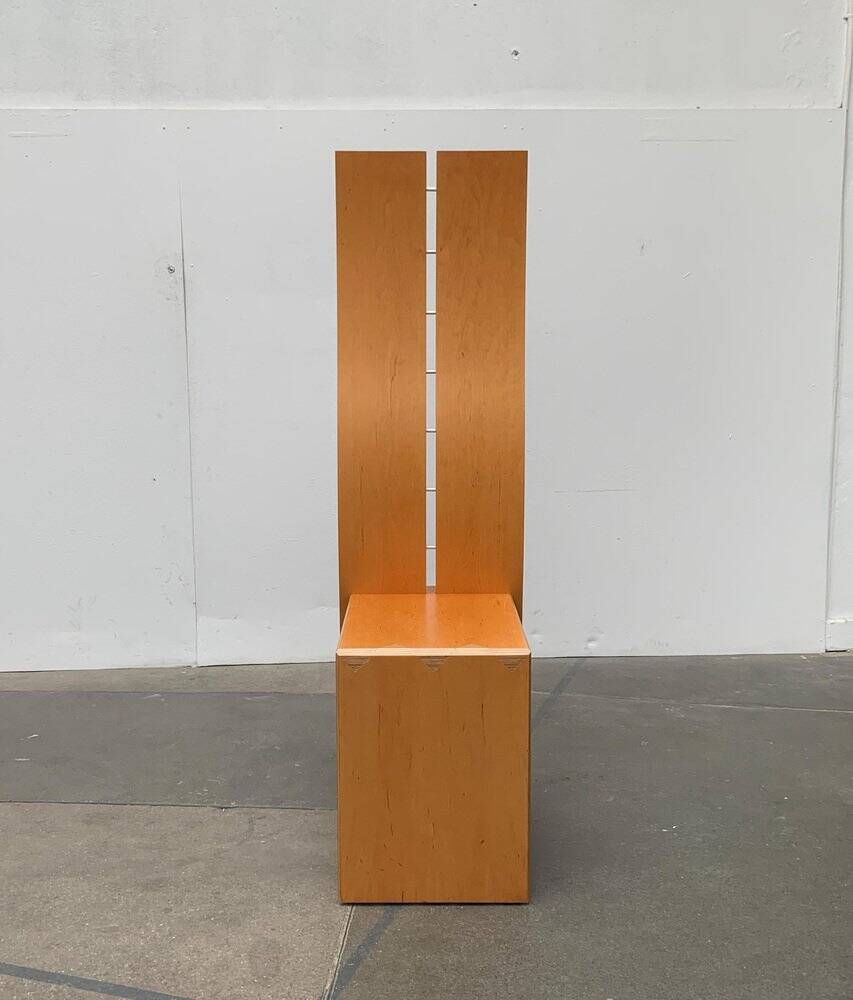 Postmodern chair with a high backrest