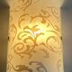 Polished and screen-printed glass sconce by eglo