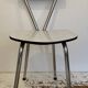 WHITE AND BLACK FORMICA CHAIR