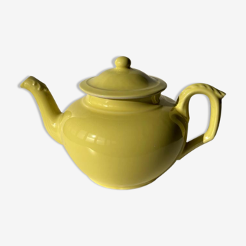 Vintage teapot with yellow filter
