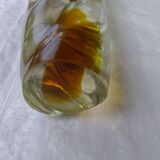 Amber-colored engraved crystal vase
