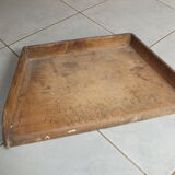 Old wooden cutting board with edges