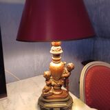 Table lamp on a piece of furniture cherub in very good condition