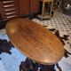 Table basse ovale Baumann en teck 1950s vintage