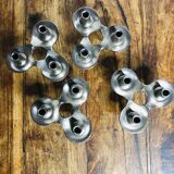 Modular chrome metal candle holders by Nagel & Stoffi. Set of 4