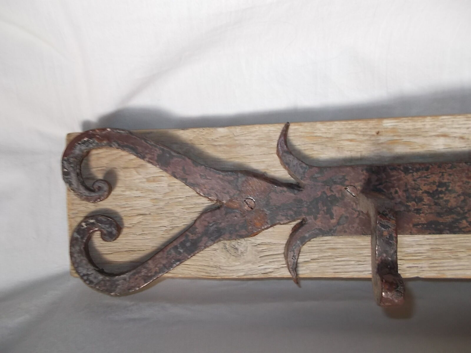 Wrought iron and wooden rack