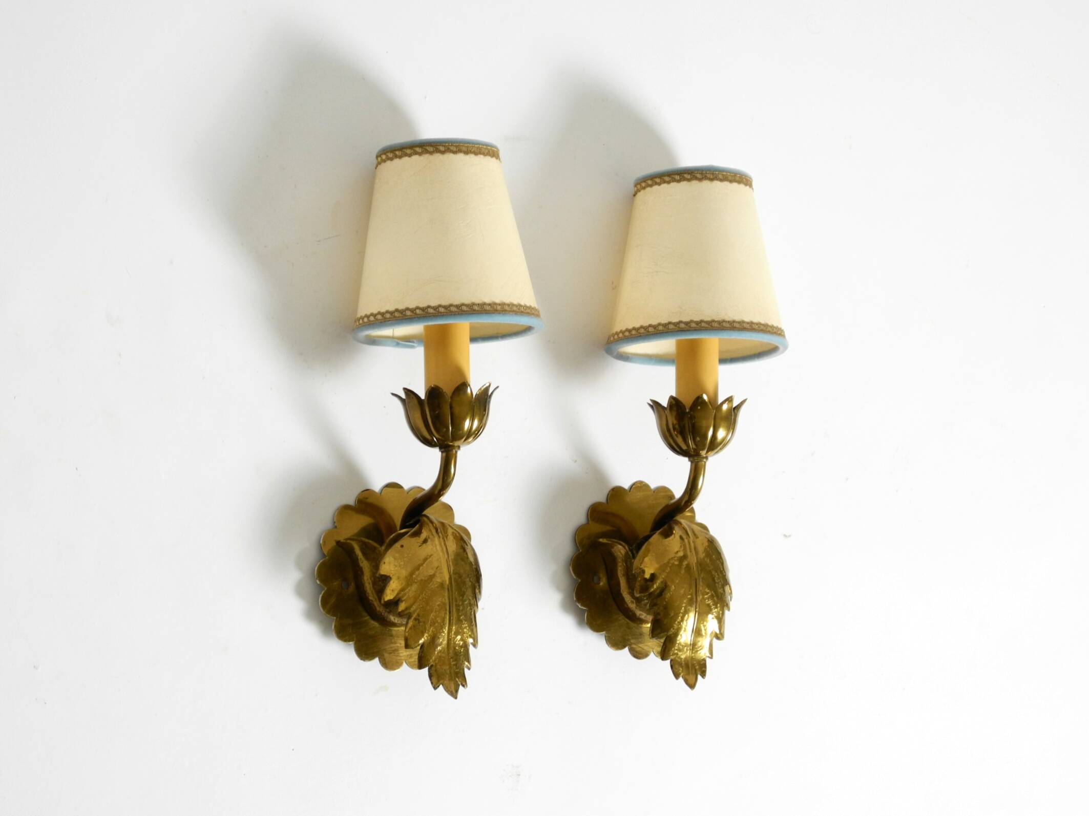 Two beautiful original Mid Century Modern floral wall lamps made of brass w