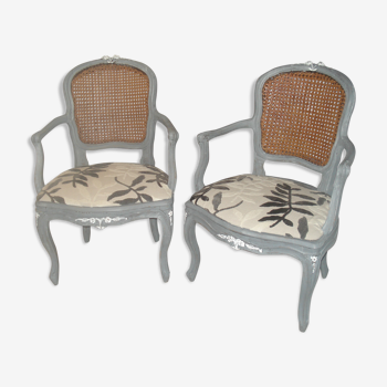 Paire de fauteuils en cannage de style Louis XV