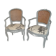 Paire de fauteuils en cannage de style Louis XV