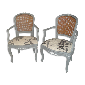 Paire de fauteuils en cannage de style Louis XV