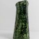 Vintage 1970s studio ceramic vase or pitcher, glazed green.