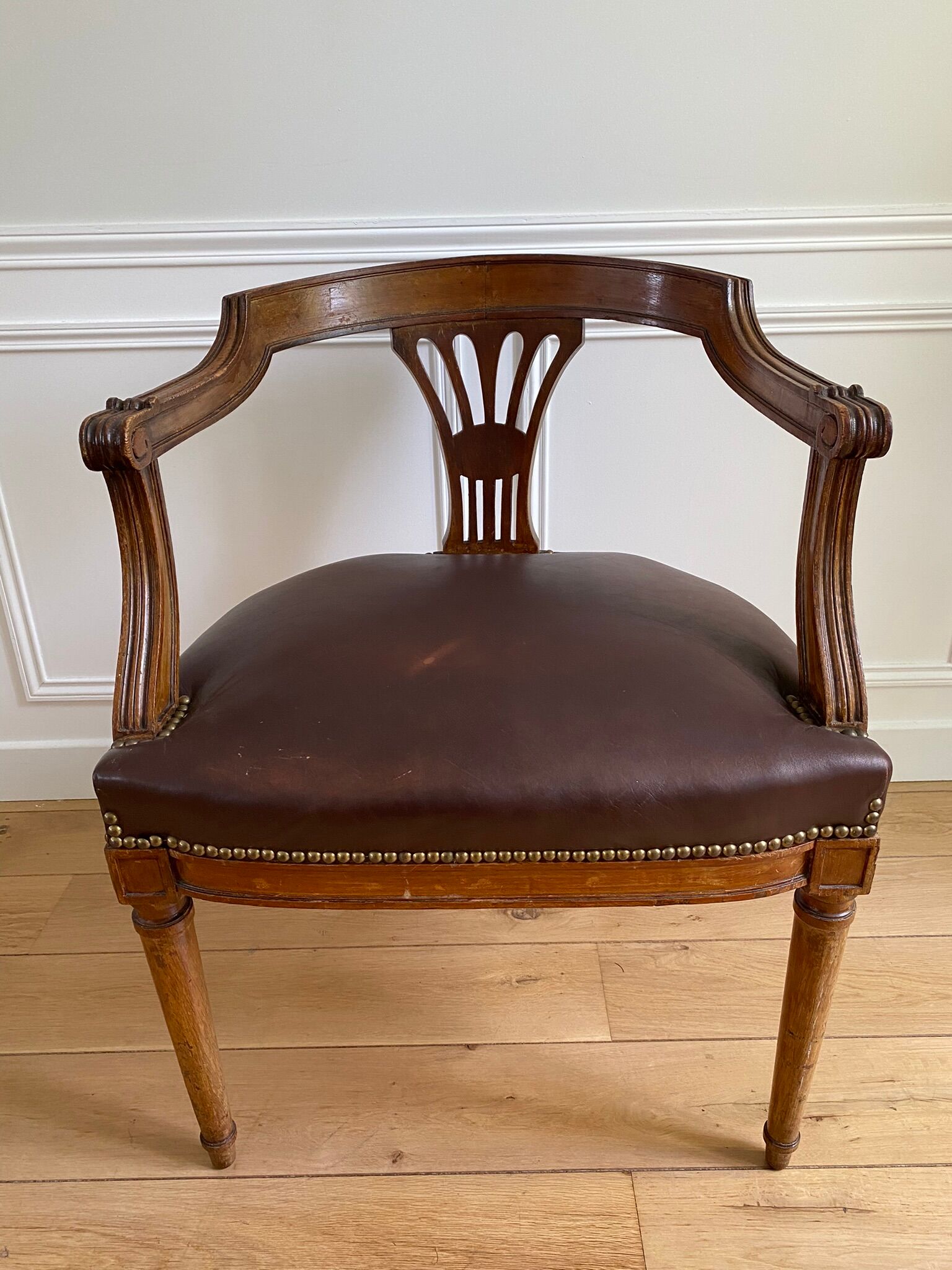 Vintage office chair in wood and brown studded leather late nineteenth