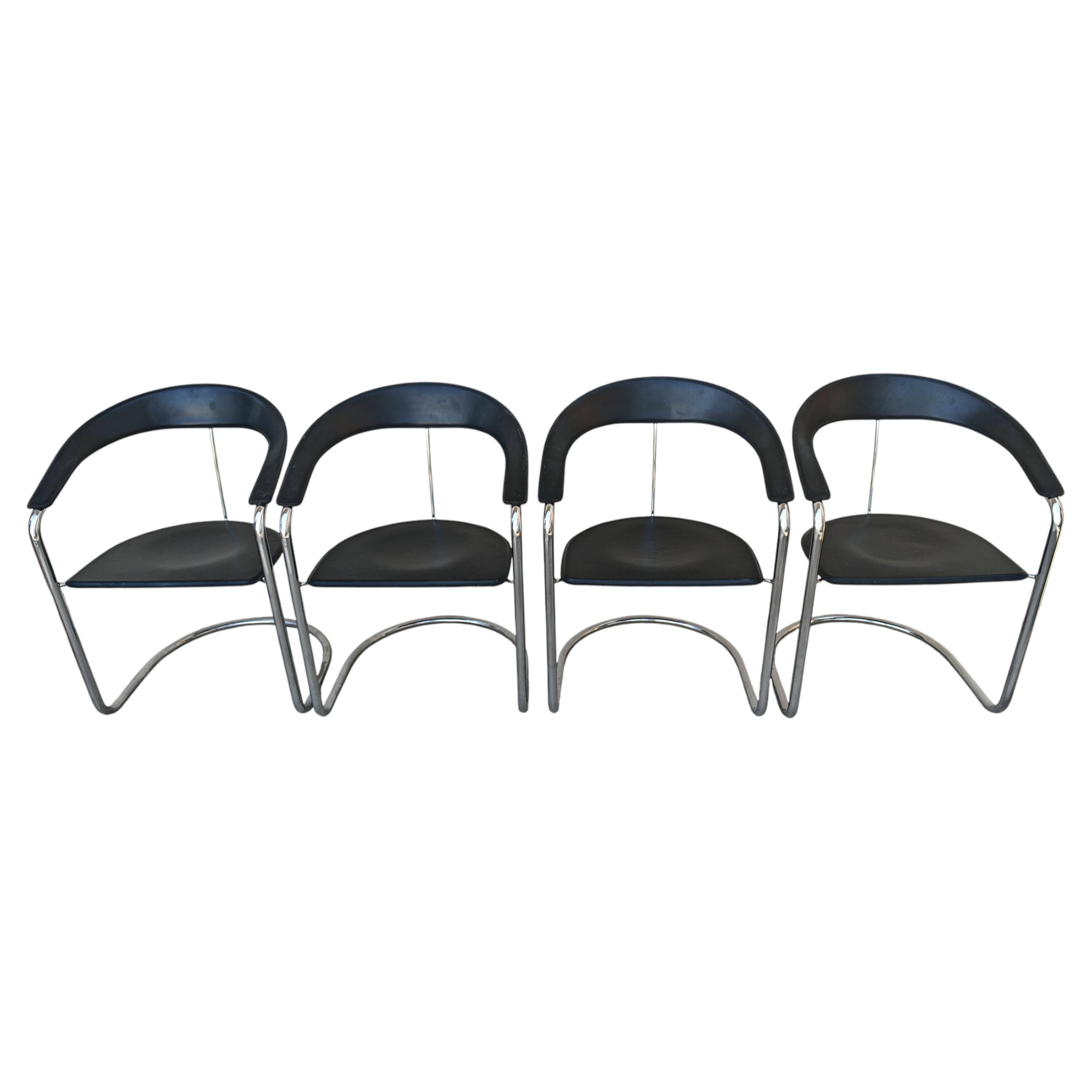 Set of 4 postmodern Canasta leather armchairs by Arrben from the 1970s.