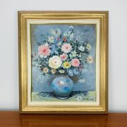 Still life painting of a bouquet of flowers, golden frame