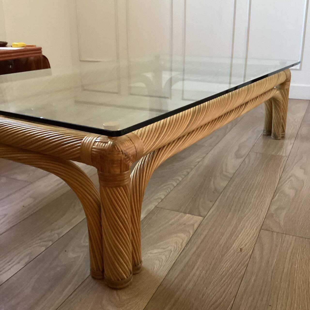 Large rattan and glass coffee table