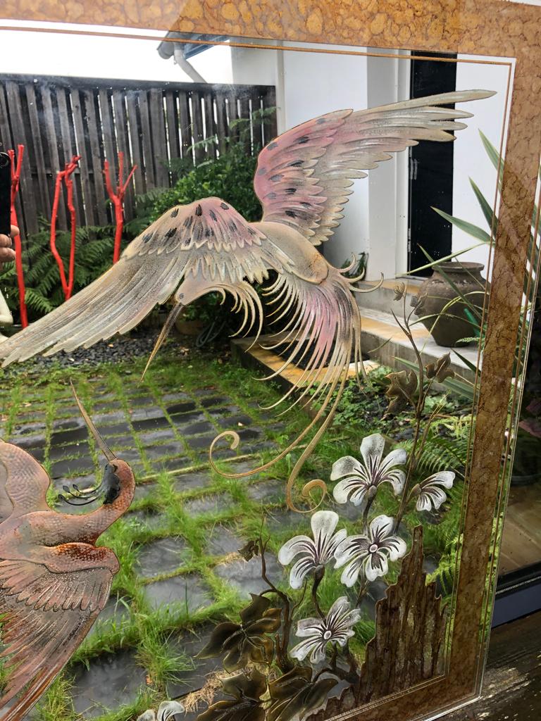 Mirror decorated with birds