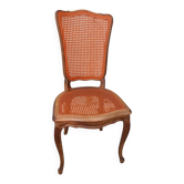 Caned chair in Louis XV style painted orange.