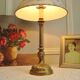 Ancient bronze lamp with its blue Jouy canvas lampshade