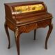 Louis XV style cylinder desk with gilded bronze mounts.