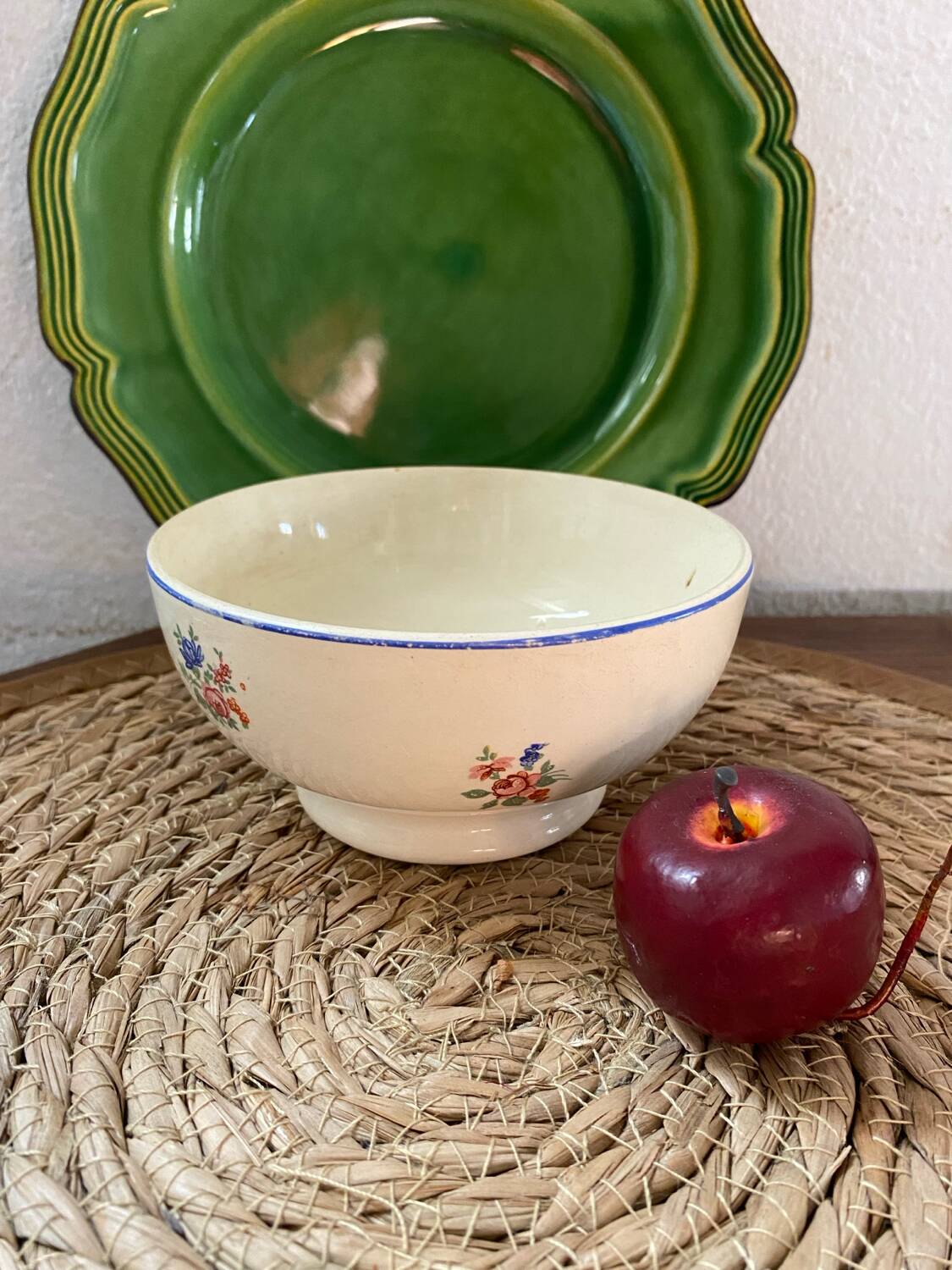 Flowery bowl with blue edging.
