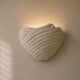 Shell-shaped ceramic applique handcrafted.