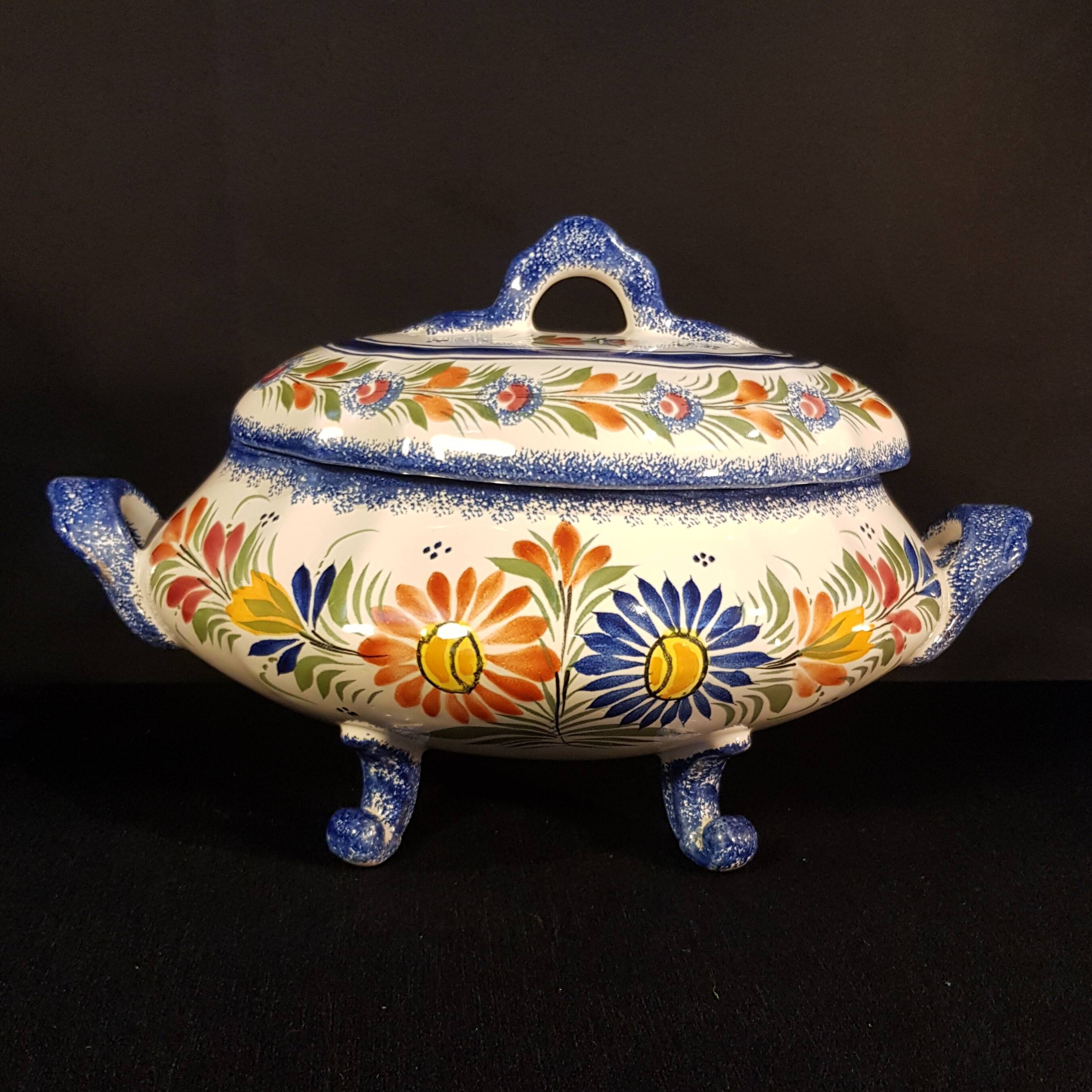 Vegetable soup tureen on Henriot Quimper display dish